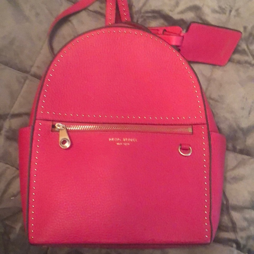 Henri Bendel pink and gold backpack with attached bonus luggage tag
